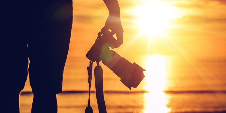 Sonnenuntergang mit einem Fotoapparat